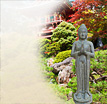 Buddha Skulpturen Berdiri: Betende Buddhastatue aus Stein
